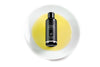 Organic Argan Oil Bottle On Plate With Oil